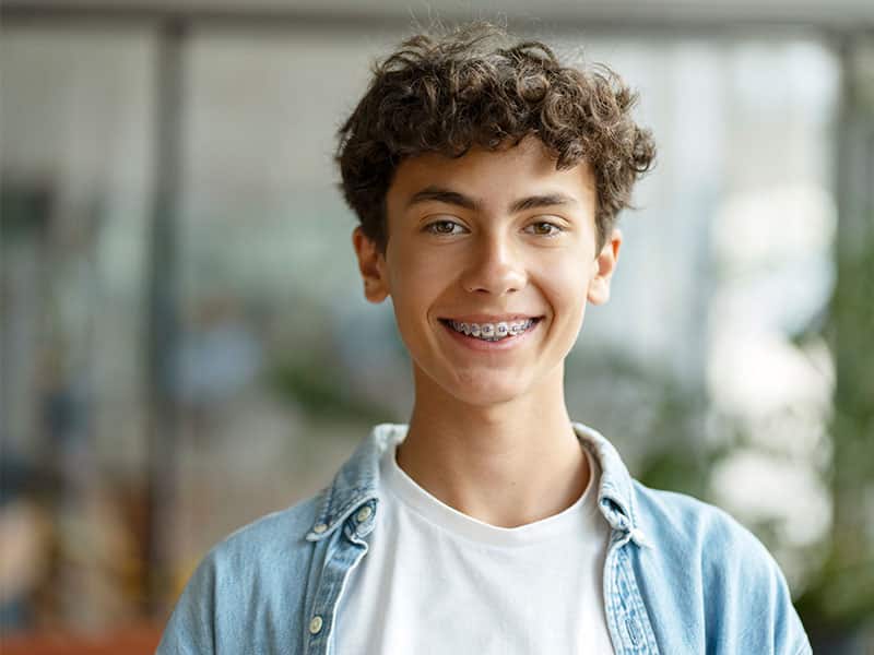Smiling boy with braces