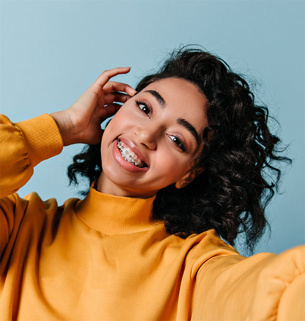 young girl with braces