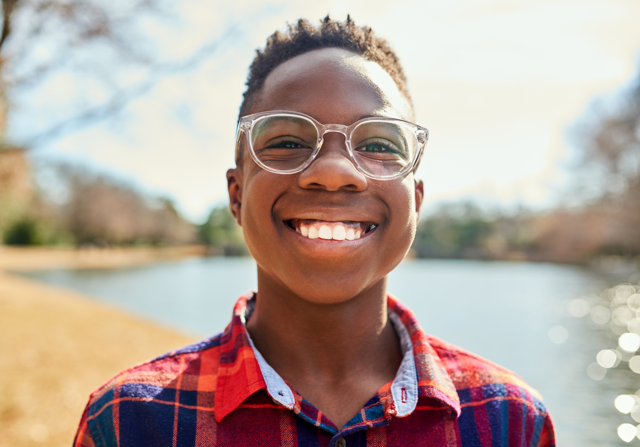 Portrait of a confident young boy outdoors