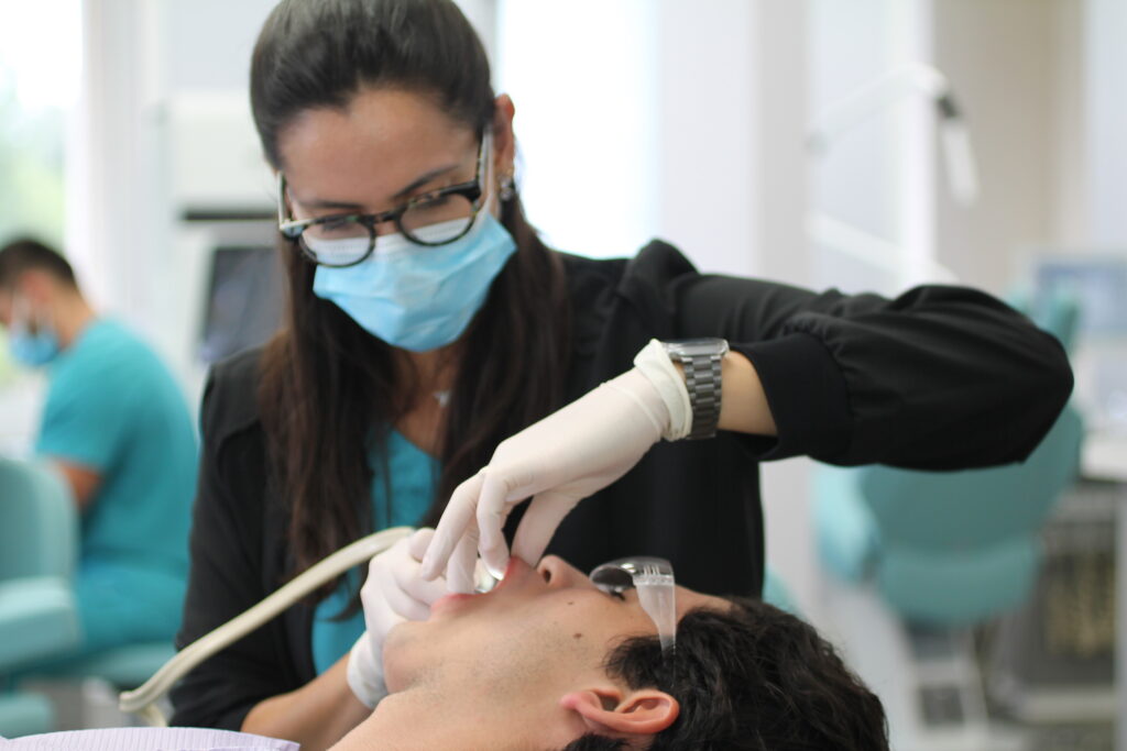 close up of a smarter orthodontics nurse helping a patient