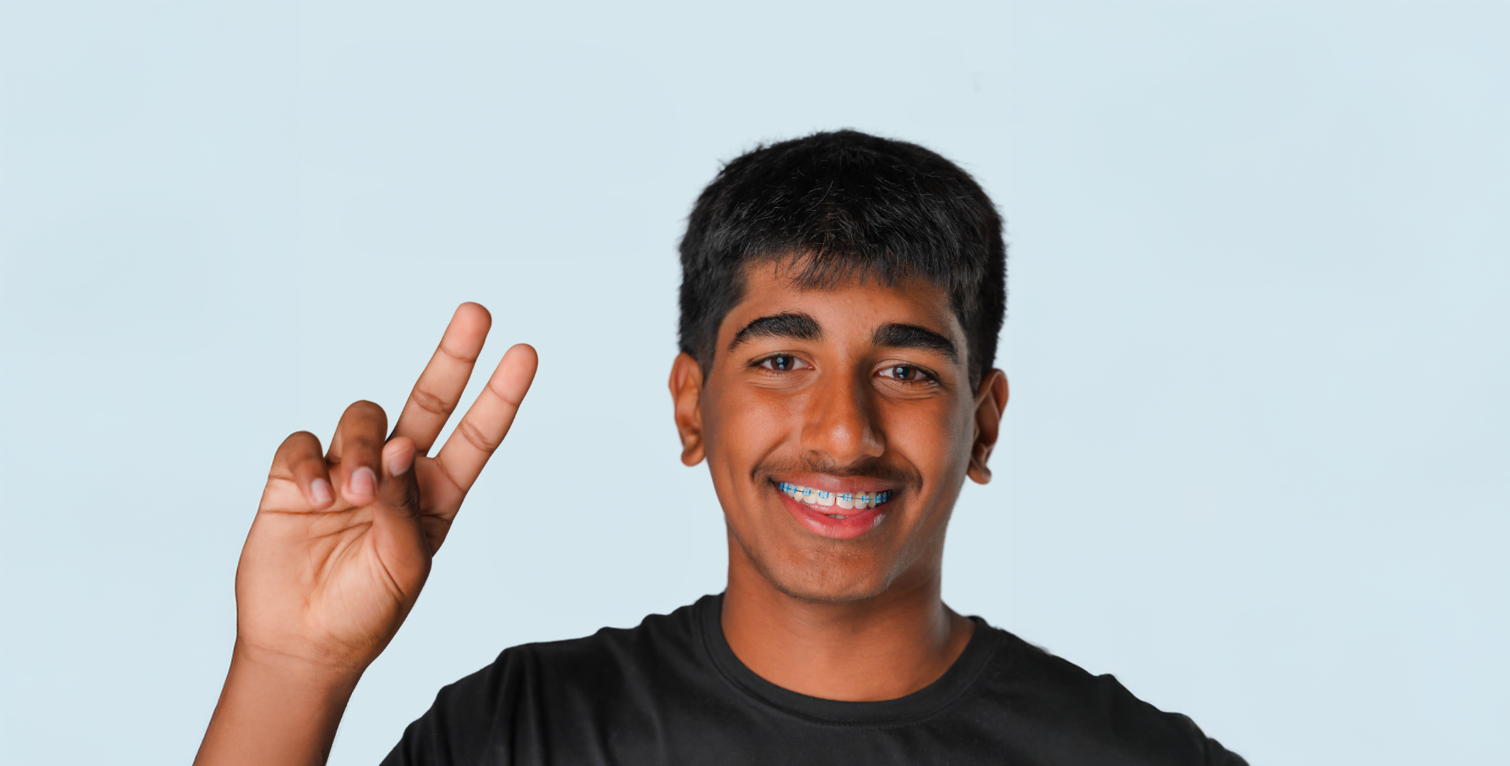 latin boy with lightforce braces
