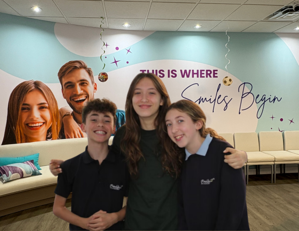 kids hugging at smarter orthodontics